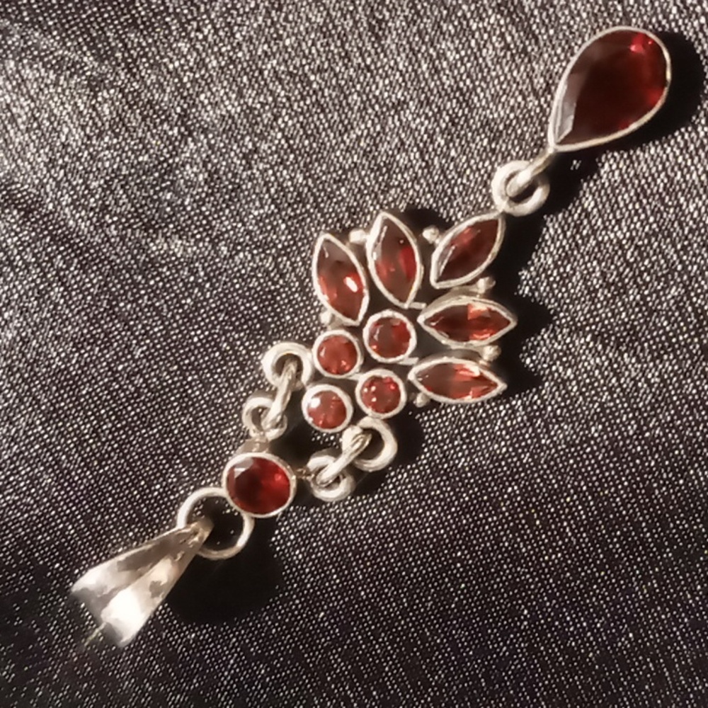 Vintage sterling silver & Garnet cluster pendant .